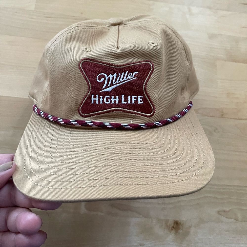 Miller High Life tan baseball cap.